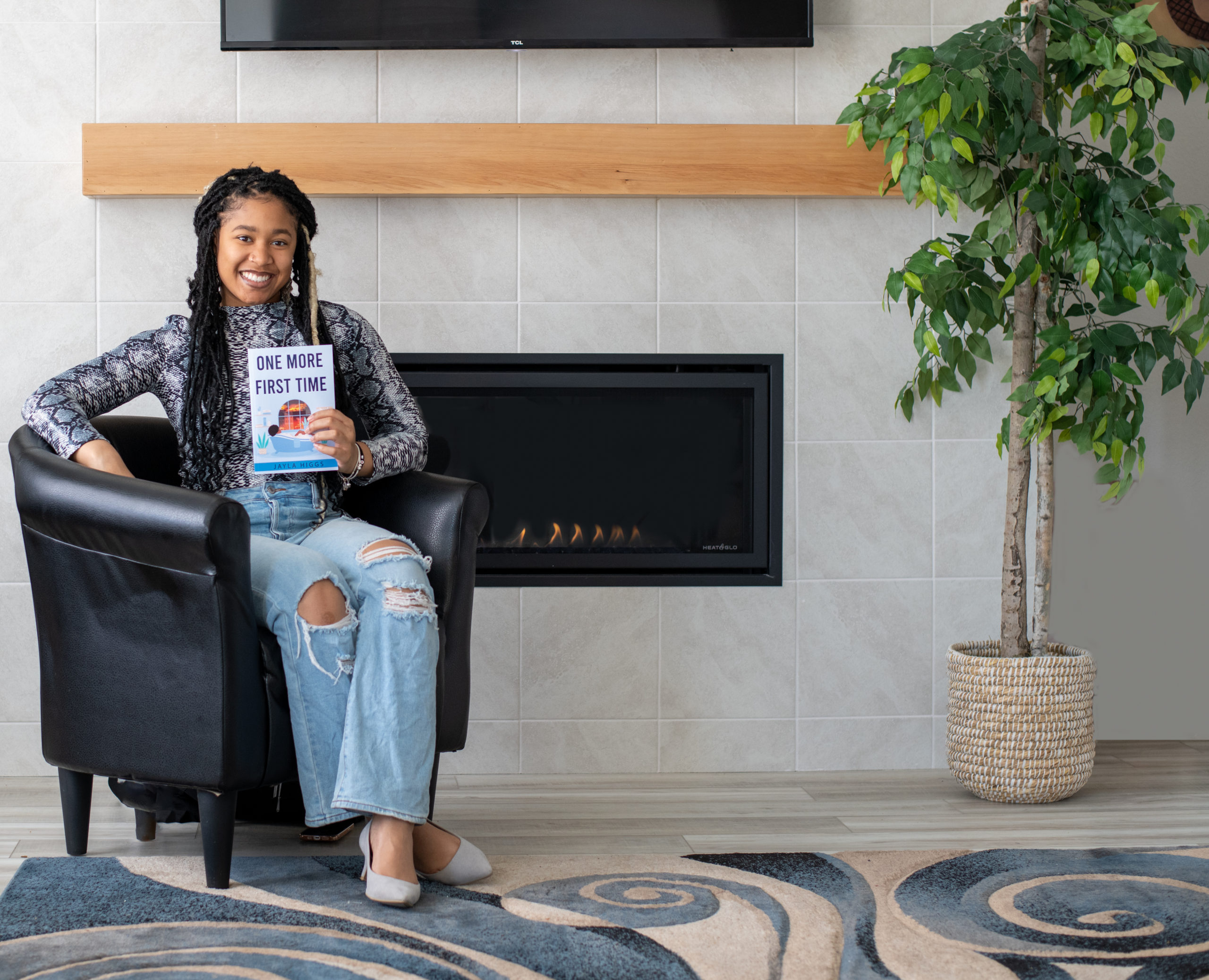 image of Jayla Higgs with her new book